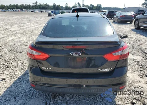 2014 Ford Focus Titanium z USA, uszkodzony, nr VIN 1FADP3J26EL123781